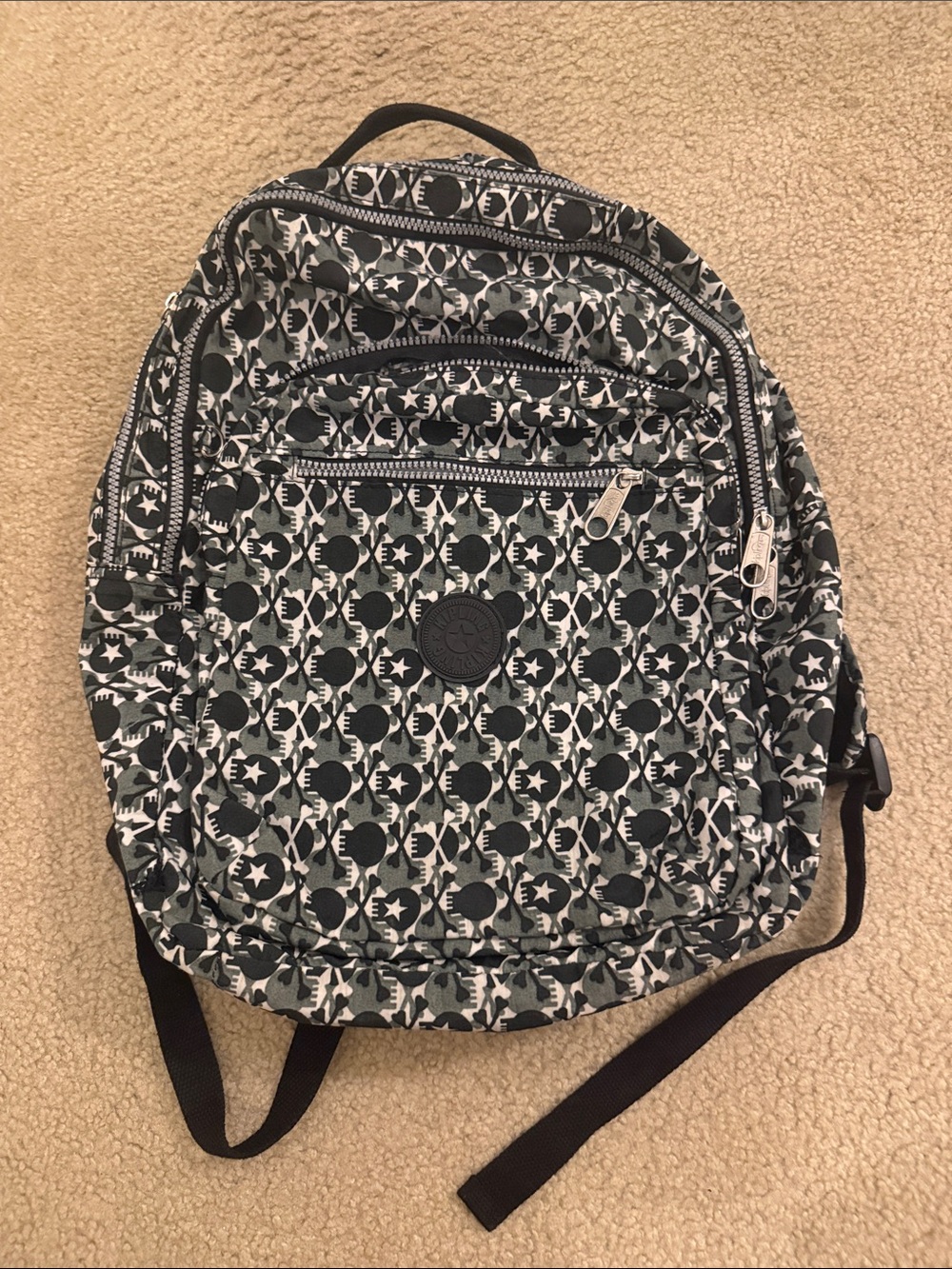 Kipling Black & White Skull and Crossed Bones Pattern Backpack